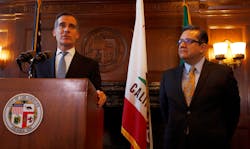Los Angeles Mayor Eric Garcetti, left, and City Administrative Officer Miguel A. Santana, right, during a 2016 news conference.