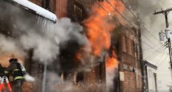 A firefighter works at the scene of the piano warehouse fire Wednesday. A firefighter works at the scene of the piano warehouse fire Wednesday.