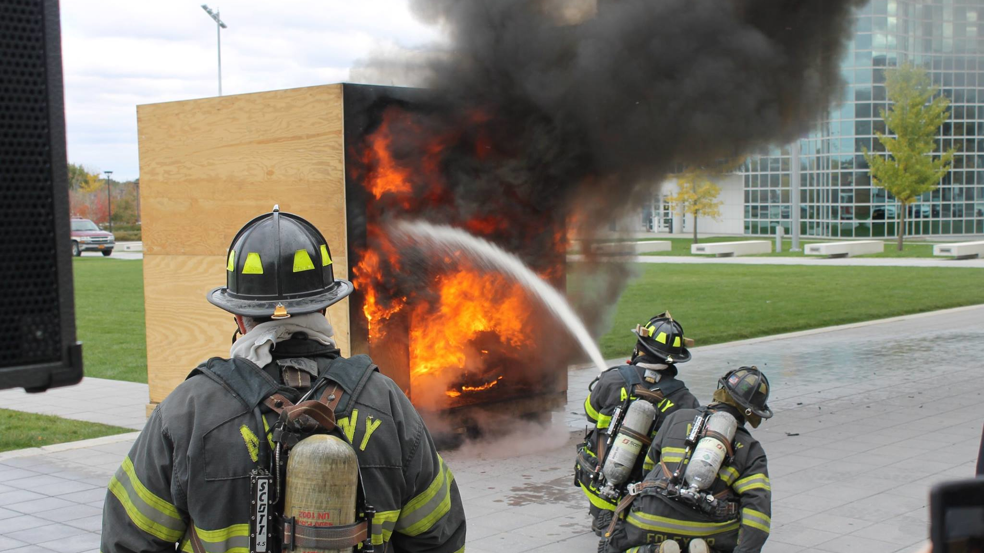 Albany, NY, firefighters stage a controlled burn during a demonstration to college students in October 2016.