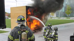 Albany, NY, firefighters stage a controlled burn during a demonstration to college students in October 2016.