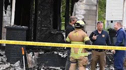 Fire investigators at the scene of the deadly house fire in Alcoa Sunday morning.