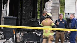 Fire investigators at the scene of the deadly house fire in Alcoa Sunday morning.