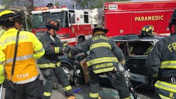 Fremont firefighters operating at the scene of a vehicle wreck in April 2017.