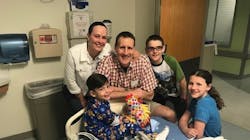 Retired Hoover, AL, Fire Capt. Keith Jacobson, his wife Dr. Elizabeth Jacobson and their two children Sam and Sarah Claire visit a young boy who nearly drowned in a hotel pool on Saturday, April 28, 2018. Retired Hoover, AL, Fire Capt. Keith Jacobson, his wife Dr. Elizabeth Jacobson and their two children Sam and Sarah Claire visit a young boy who nearly drowned in a hotel pool on Saturday, April 28, 2018.