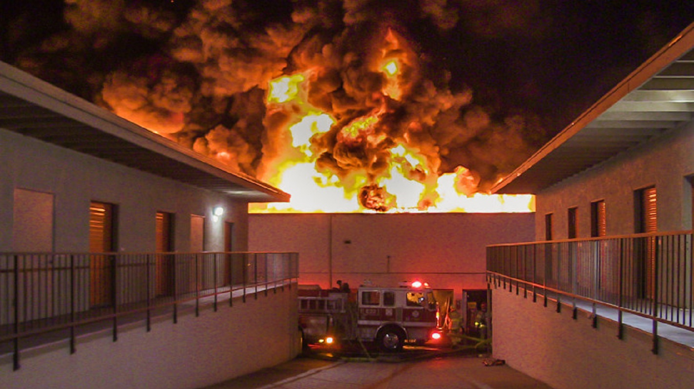 Crews with the Orange County Fire Authority on scene Sunday, April 29, 2018, during a massive fire at a self-storage facility in Laguna Hills, CA.