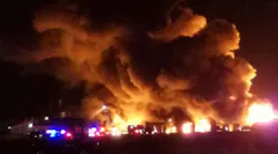 A three-alarm fire spread through the Perryville condominium complex.