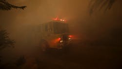 A fire apparatus responding as wildfire burns near homes on East Mountain Drive in Montecito, CA, on Dec. 16, 2017. A fire apparatus responding as wildfire burns near homes on East Mountain Drive in Montecito, CA, on Dec. 16, 2017.