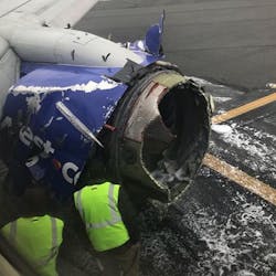 Workers inspect the engine compartment on a Southwest Airlines plane after an explosion forced an emergency landing at Philadelphia International Airport on Tuesday, April 17, 2018. Workers inspect the engine compartment on a Southwest Airlines plane after an explosion forced an emergency landing at Philadelphia International Airport on Tuesday, April 17, 2018.