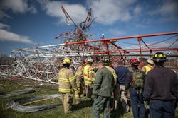 Crews assessed the site to determine how to extricate the worker who had been killed in the collapse. Crews assessed the site to determine how to extricate the worker who had been killed in the collapse.