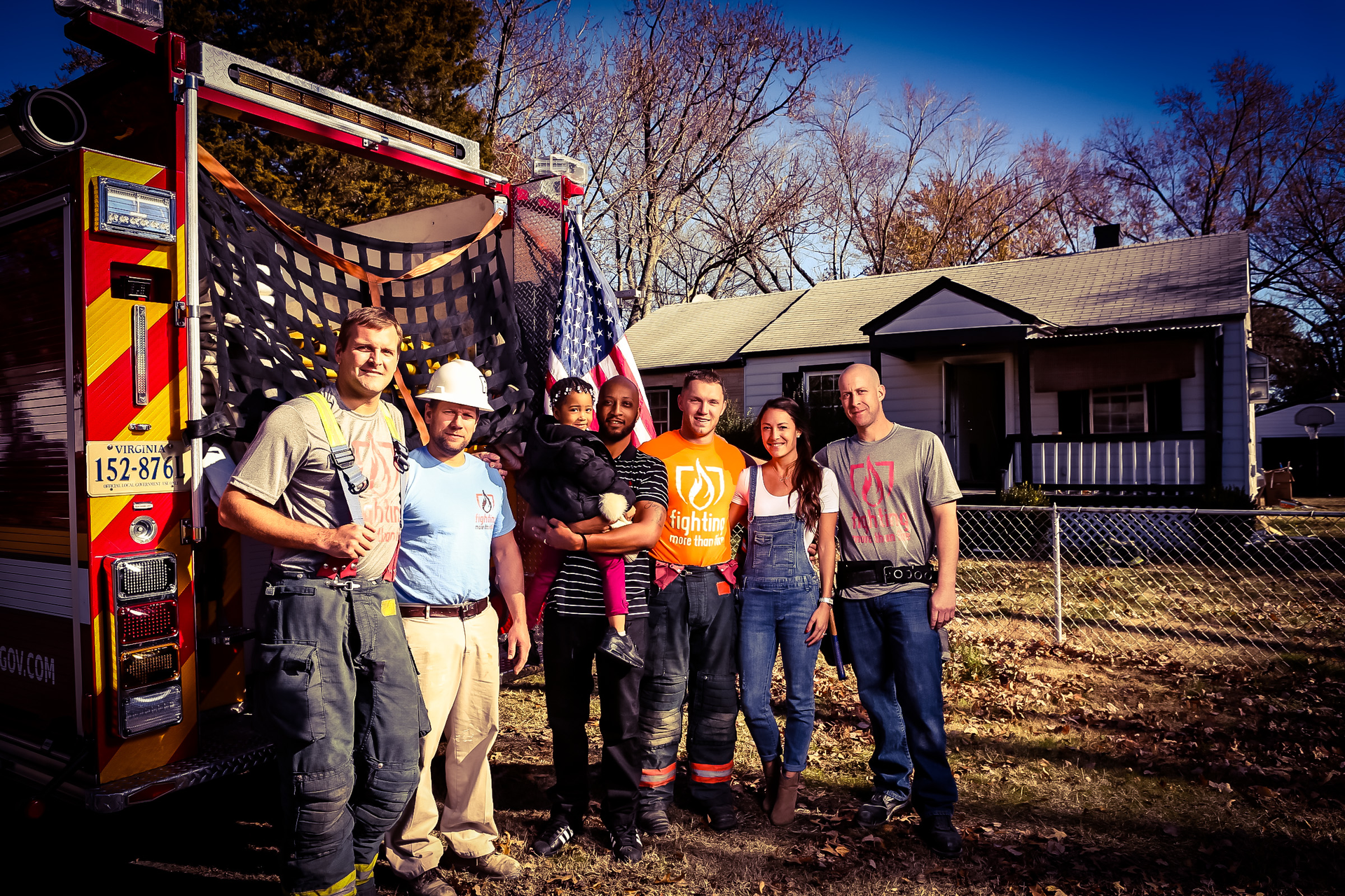 Pictured left to right: Mike Anderson, Chris Mack, John Pettaway, Jesse Baust, Lauren Baust and Shaun Whiteley. The Fighting More Than Fire team helped rebuild Pettaway's home following a fire.