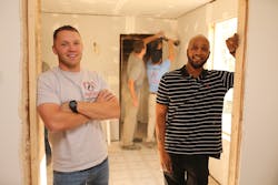 Jesse Baust and John Pettaway during construction on Pettaway's home following a fire. Jesse Baust and John Pettaway during construction on Pettaway's home following a fire.