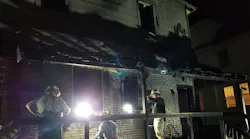 Collingswood firefighters remain on scene after an apartment fire during which they rescued two women from a second-story window on Tuesday, May 8, 2018.