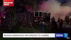 A mechanical problem caused a fire aboard this pumper during a warehouse fire in Houston. A mechanical problem caused a fire aboard this pumper during a warehouse fire in Houston.