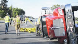 A Laurinburg, NC, apparatus lays on its side after being struck by an SUV while responding to a fire on Thursday, May 3, 2018. A Laurinburg, NC, apparatus lays on its side after being struck by an SUV while responding to a fire on Thursday, May 3, 2018.