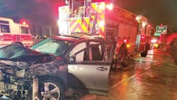 A Toyota SUV sits mangled after a wreck in which two firefighters were struck and one person was killed along I-95 in Miami, FL, on Saturday, May 19, 2018.