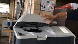 A firefighter demonstrates use of a needle and syringe disposal unit at a fire station in Fall River, MA. A firefighter demonstrates use of a needle and syringe disposal unit at a fire station in Fall River, MA.