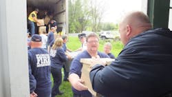 Florida, NY, firefighters help unload a truck full of Christmas gifts sent to fire survivor Safyre Terry in 2015. Florida, NY, firefighters help unload a truck full of Christmas gifts sent to fire survivor Safyre Terry in 2015.