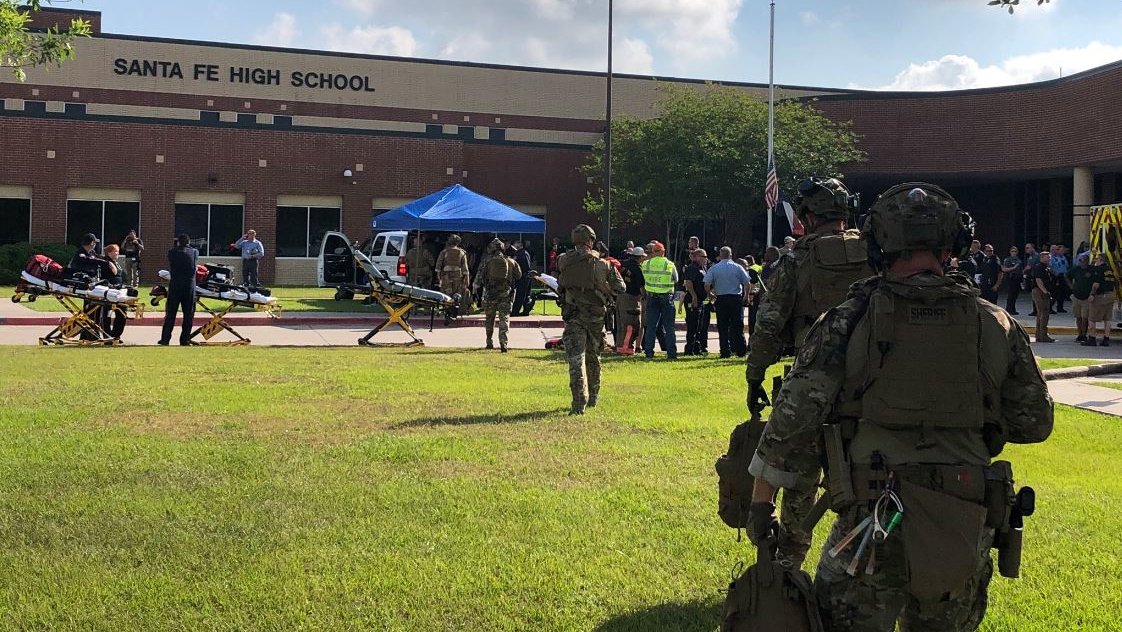 Emergency responders on scene at Santa Fe High School in Santa Fe, TX, after a gunman opened fire on Friday, May 18, 2018, killing at least eight people.
