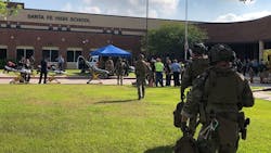 Emergency responders on scene at Santa Fe High School in Santa Fe, TX, after a gunman opened fire on Friday, May 18, 2018, killing at least eight people. Emergency responders on scene at Santa Fe High School in Santa Fe, TX, after a gunman opened fire on Friday, May 18, 2018, killing at least eight people.