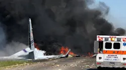 Flaming pieces of a military C130 cargo plane litter Gulfstream Rd. in Savannah, GA, after a crash on Wednesday, May 2, 2018, that killed at least five people.