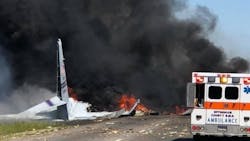 Flaming pieces of a military C130 cargo plane litter Gulfstream Rd. in Savannah, GA, after a crash on Wednesday, May 2, 2018, that killed at least five people. Flaming pieces of a military C130 cargo plane litter Gulfstream Rd. in Savannah, GA, after a crash on Wednesday, May 2, 2018, that killed at least five people.