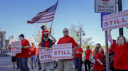 Firefighters and their supporters gather in protest on Monday, May 7, 2018, in Somerset, NH.