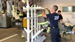 Laundered pieces of turnout gear are hung on a rack designed by a Toledo, OH, firefighter to speed up drying time and encourage colleagues to more frequently wash their gear. Laundered pieces of turnout gear are hung on a rack designed by a Toledo, OH, firefighter to speed up drying time and encourage colleagues to more frequently wash their gear.