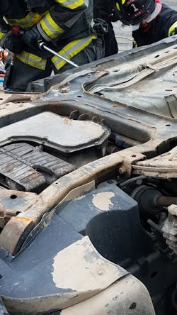 Air chisels can be used successfully to gain entry to the vehicle in difficult to access positions. Here the student is using the air chisel to cut the outer skin of the door to gain access to the hinges on the overturned vehicle. Air chisels can be used successfully to gain entry to the vehicle in difficult to access positions. Here the student is using the air chisel to cut the outer skin of the door to gain access to the hinges on the overturned vehicle.