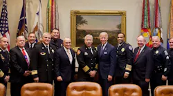 Representing the leadership within law enforcement, fire, EMS and emergency communications who fought to secure the D Block for the sole use of public safety: (From left to right) Charles Werner, Dick Mirgon, Chuck Dowd, Jeff Johnson, Chris Moore, Ray Kelly, Al Gillespie, Vice President Joe Biden, Walt McNeil, Harlin McEwen, Mick McHale and Tommy Nee. Photo taken on Feb. 21, 2012, just before Congress allocated the D Block to public safety.