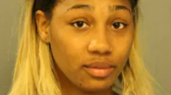 Latorya Thigpen is accused of punching, kicking and spitting two Chicago Fire Department paramedics.