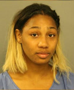 Latorya Thigpen is accused of punching, kicking and spitting two Chicago Fire Department paramedics. Latorya Thigpen is accused of punching, kicking and spitting two Chicago Fire Department paramedics.