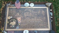 Eric Marsh&rsquo;s headstone at Pioneers Home Cemetery in Prescott, where many of the crew are buried. Friends and family often leave trinkets at his grave.