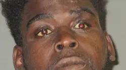 A booking photo of Jaylan Franklin, 22.