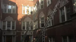 The courtyard of an apartment building in the Rogers Park section of Chicago where two firefighters were injured during a fire on Wednesday, May 23, 2018.