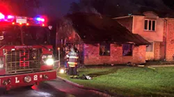 Firefighters remain on scene after battling a fire at a large two-story home in Syosset, NY, on Tuesday, May 29, 2018. Firefighters remain on scene after battling a fire at a large two-story home in Syosset, NY, on Tuesday, May 29, 2018.