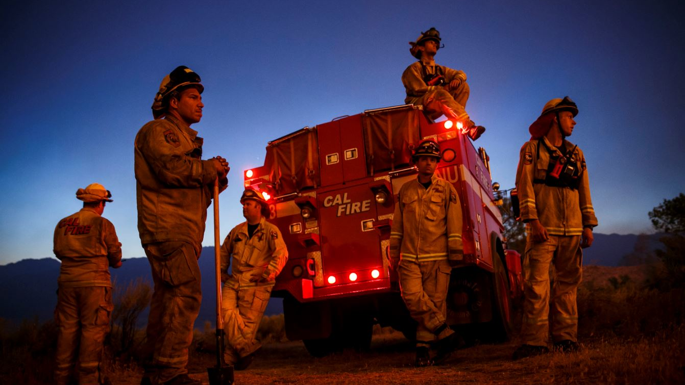 Firefighters from Cal Fire's Sonoma-Lake-Napa Unit pay close attention to a wildfire in the Kelso Valley on June 24, 2016, in Lake Isabella, CA.