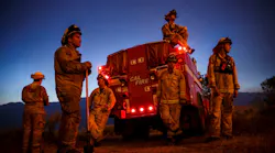 Firefighters from Cal Fire's Sonoma-Lake-Napa Unit pay close attention to a wildfire in the Kelso Valley on June 24, 2016, in Lake Isabella, CA.