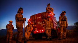 Firefighters from Cal Fire's Sonoma-Lake-Napa Unit pay close attention to a wildfire in the Kelso Valley on June 24, 2016, in Lake Isabella, CA. Firefighters from Cal Fire's Sonoma-Lake-Napa Unit pay close attention to a wildfire in the Kelso Valley on June 24, 2016, in Lake Isabella, CA.