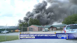 Smoke rises as a fire burns at a recycling facility near Winchester in Clark County, KY, on Saturday, June 9, 2018.