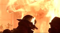 The heat was so intense during a suspicious fire in Houston on Thursday, June 21, 2018, that a firefighter&apos;s helmet caught fire.