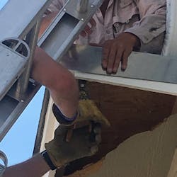 A Colorado Springs firefighter uses tools to help free a carpenter who accidentally nailed his thumb to the roof of a home on Tuesday, June 5, 2018. A Colorado Springs firefighter uses tools to help free a carpenter who accidentally nailed his thumb to the roof of a home on Tuesday, June 5, 2018.