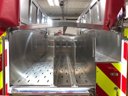 Aluminum hose bed covers flip up and out of the way for easy access to the hose bed. Hard surface covers also provide solid walking surface on top of the apparatus.