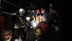 Members of MDI Search &amp; Rescue along with park staff and Bar Harbor, ME, firefighters work to rescue an injured hiker in Acadia National Park on Monday, July 23, 2018.