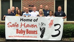 Decatur Township firefighters pose for photos after it was announced on June 21, 2018, that their station would install a 'Safe Haven Baby Box.' Decatur Township firefighters pose for photos after it was announced on June 21, 2018, that their station would install a 'Safe Haven Baby Box.'
