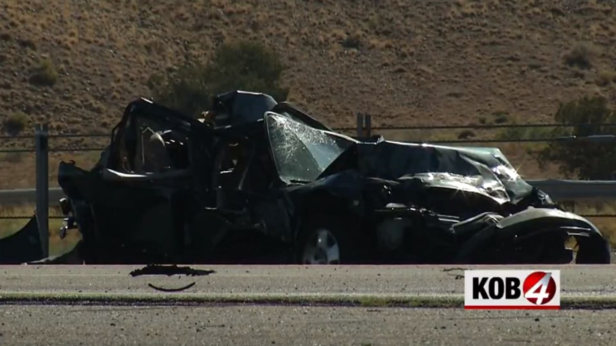 A mangled car that was involved in a multi-vehicle wreck that killed three people and injured two dozen others in Bernalillo, NM, on Sunday, July 15, 2018.