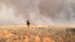 A Cal Fire firefighter during efforts to contain the County Fire on Thursday, July 5, 2018. A Cal Fire firefighter during efforts to contain the County Fire on Thursday, July 5, 2018.