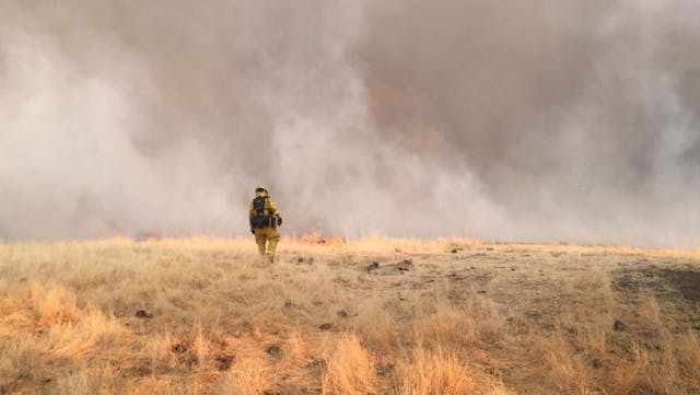 A Cal Fire firefighter during efforts to contain the County Fire on Thursday, July 5, 2018.