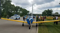 A small plane sits on South Lake Shore Drive in Chicago after making a safe emergency landing when it couldn't reach Midway Airport on Friday, July 27, 2018.