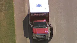 Some damage can be seen on the front of a Dallas Fire-Rescue ambulance involved in a wreck that hospitalized two firefighter/paramedics on Wednesday, July 25, 2018.