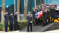 The casket of fallen Long Beach fire Capt. David Rosa is carried by his fellow firefighters during a memorial service at the Long Beach Convention Center on Tuesday, July 3, 2018. The casket of fallen Long Beach fire Capt. David Rosa is carried by his fellow firefighters during a memorial service at the Long Beach Convention Center on Tuesday, July 3, 2018.